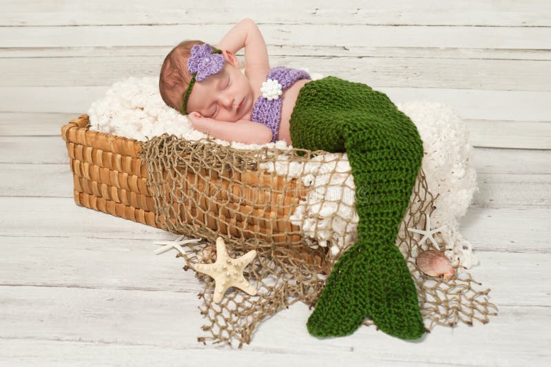 Newborn Baby Girl Wearing a Mermaid Costume stock photography Newborn Baby Girl Wearing a Mermaid Costume stock photography