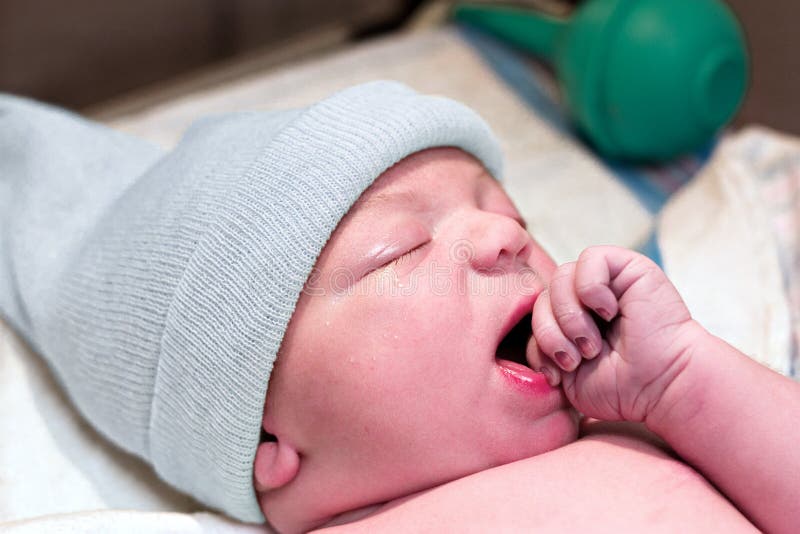 Newborn baby resting in hospital