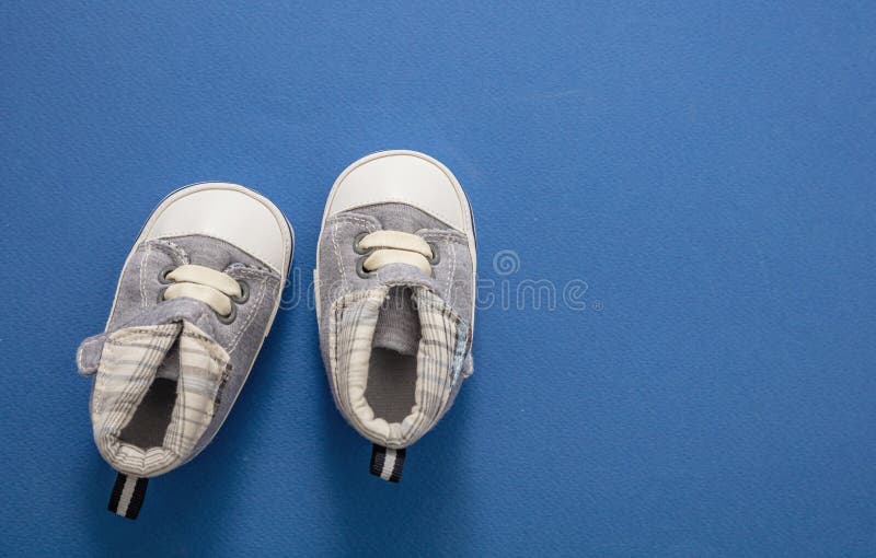 Baby Boy Shoes on Pastel Blue and Wooden Background, Banner Stock Photo ...