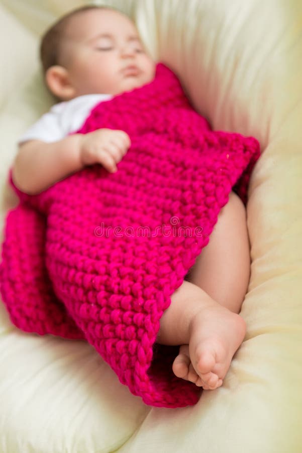 Newborn baby sleeping in bed stock photo Newborn baby sleeping in bed stock photo
