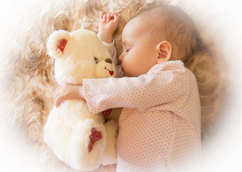 Newborn Baby Sleeps with a Teddy Bear Stock Photo Image of hugging