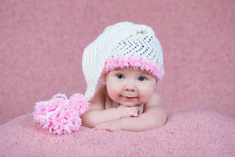 Newborn Baby in a Warm Knitted Hat. Stock Photo Image of newborn