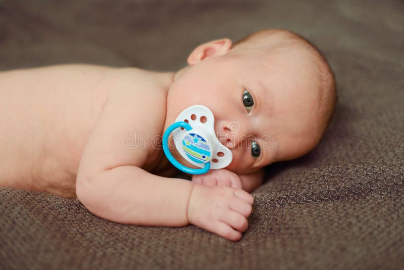 Newborn with dummy stock photo. Image of beauty, child 46809398