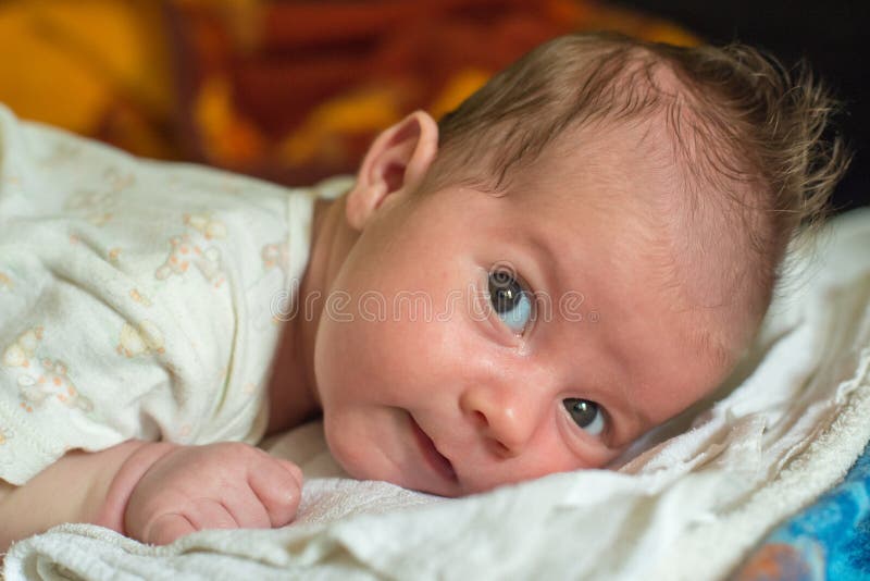 The Newborn One Month Old Baby Lying on the Bed Stock Image Image of