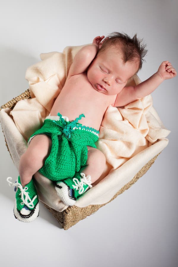 Newborn Sleep in the Basket after Helping Her Mother in the Laundry Washing Stock Photo Image