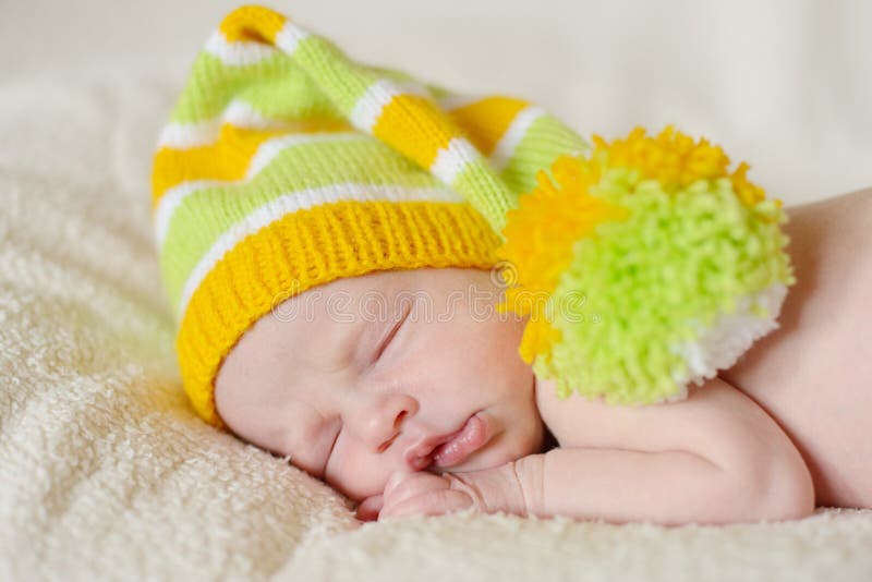 Baby Newborn Portrait, Boy Kid New Born Sleeping in Blue Hat Stock