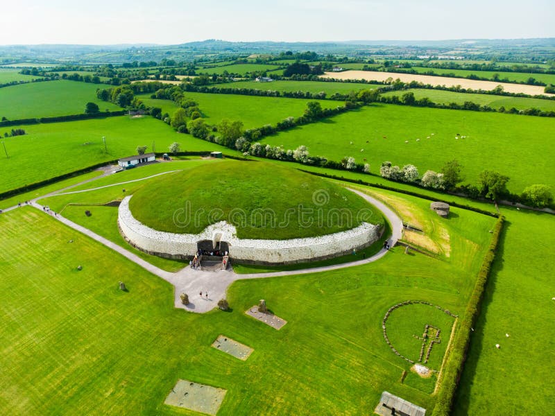 Newgrange, a prehistoric monument built during the Neolithic period, located in County Meath, Ireland. One of the most popular tourist attractions in Ireland, UNESCO World Heritage Site. Newgrange, a prehistoric monument built during the Neolithic period, located in County Meath, Ireland. One of the most popular tourist attractions in Ireland, UNESCO World Heritage Site.