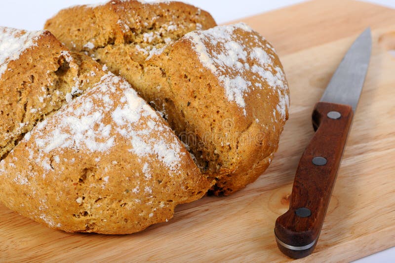 Newlybaked Bread and a Knife Stock Image Image of eating, closeup