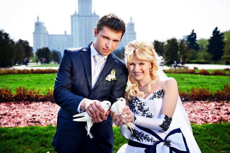 Newlyweds with pigeons