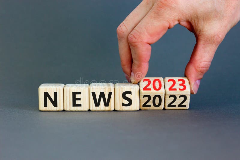 News New Year Symbol Businessman Turns Wooden Cube Changes Words To Beautiful Grey Table Background Copy Space Business 254953632 