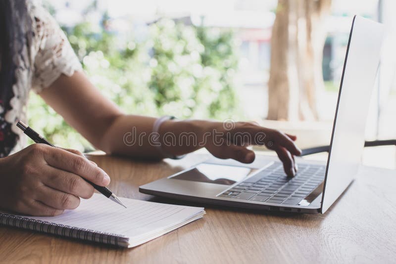 Newsletter concept Hand of businesswoman checking message box on mock up digital laptop Vintage tone filter.Top view royalty free stock images Newsletter concept Hand of businesswoman checking message box on mock up digital laptop Vintage tone filter.Top view royalty free stock images