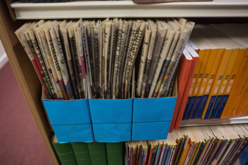 Newspapers on Bookshelf in Library Stock Image Image of shelf