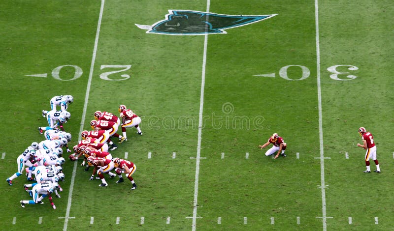 The Washington Redskins prepare to kick a field goal against the Carolina Panthers during an NFL football game in Charlotte, North Carolina. The Washington Redskins prepare to kick a field goal against the Carolina Panthers during an NFL football game in Charlotte, North Carolina.