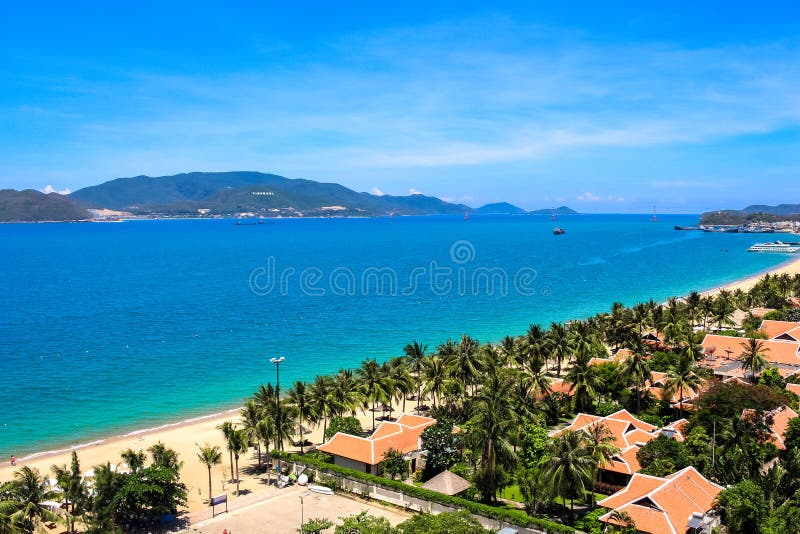 City Seascape with Aerial View of Nha Trang Bay, Islands, Mountains, Sandy Beach, Turquoise Water and Blue Sky stock photography City Seascape with Aerial View of Nha Trang Bay, Islands, Mountains, Sandy Beach, Turquoise Water and Blue Sky stock photography