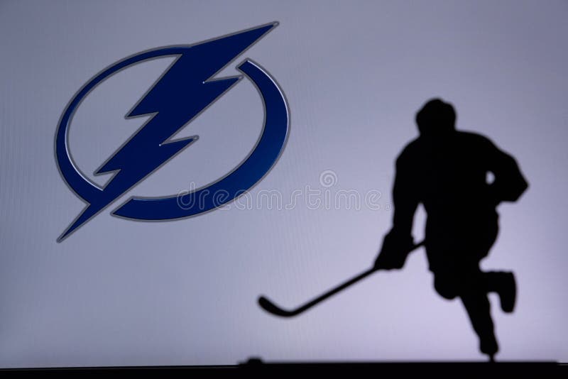 TORONTO, CANADA, 17. JULY: Tampa Bay Lightning Concept photo. silhouette of profesiional NHL hockey player. TORONTO, CANADA, 17. JULY: Tampa Bay Lightning Concept photo. silhouette of profesiional NHL hockey player