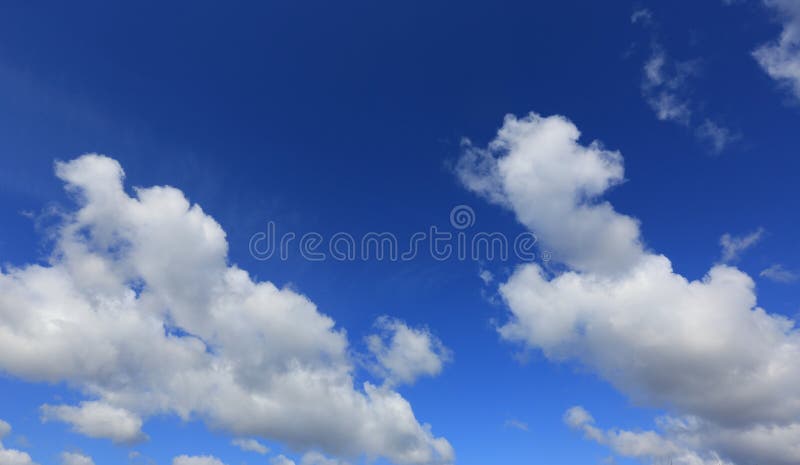 Nice clouds in blue sky stock photography
