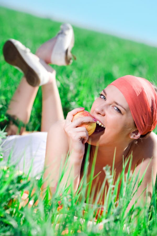 Nice girl with apple