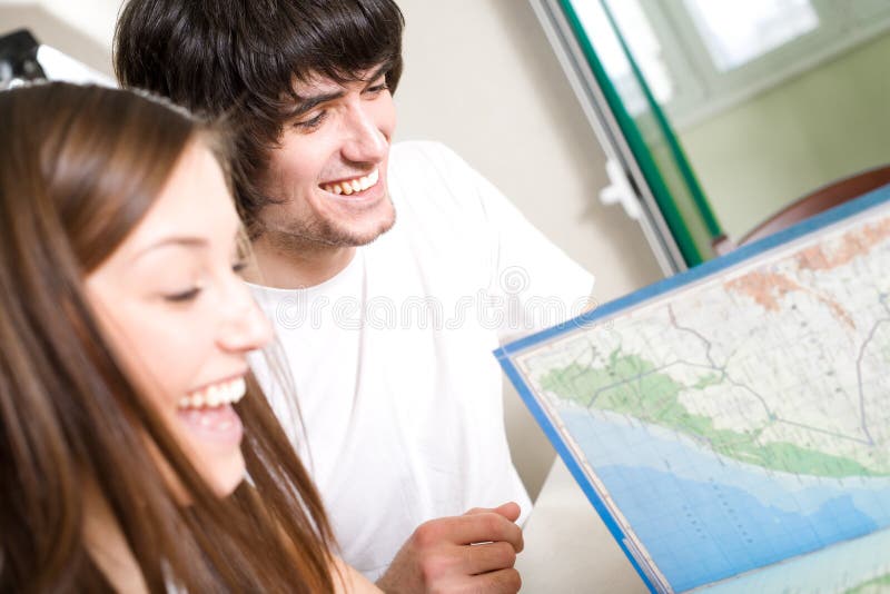 Nice girl and boy with book