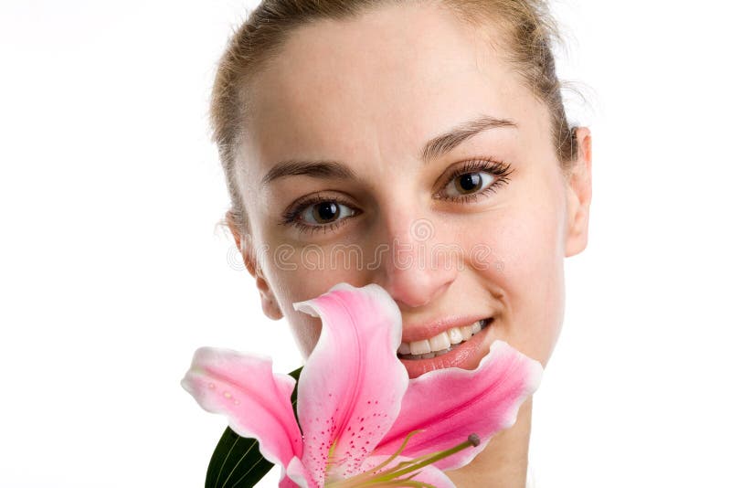 Nice girl with a pink lily