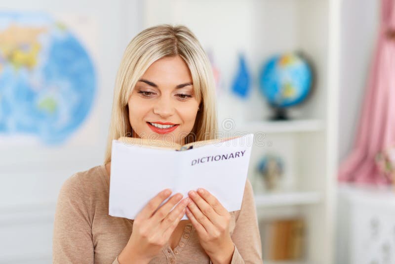 Nice Girl Reading Dictionary Stock Photos Free & RoyaltyFree Stock