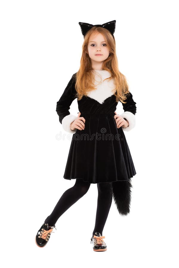 Nice little girl dressed as black cat. Isolated on white