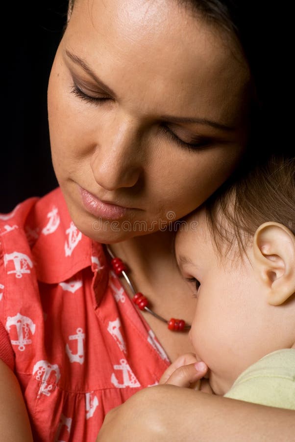 Nice mom and baby on black