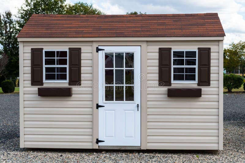 a nice new gray storage shed