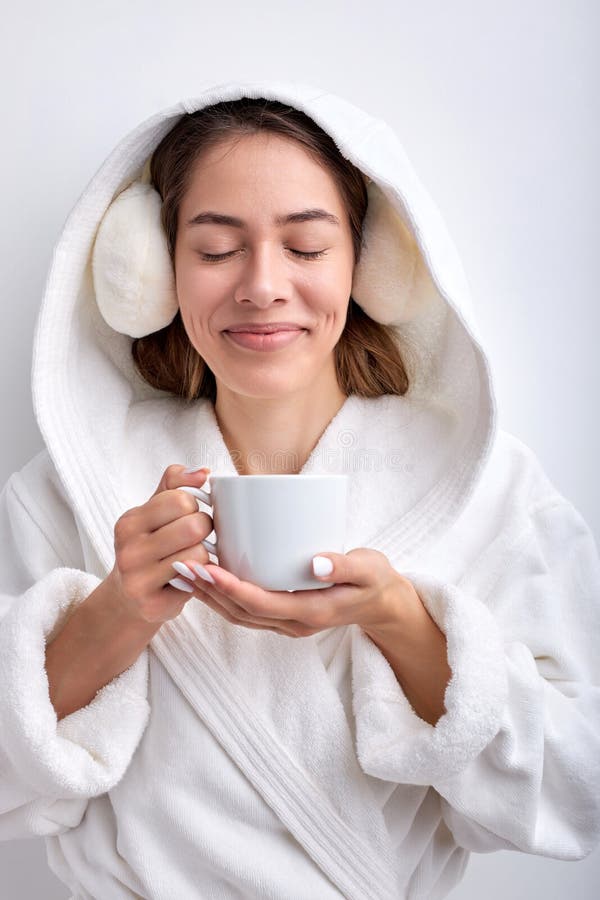 Nice Pleasant Woman Holding Mug in Hands, Drinking Tea or Coffee ...