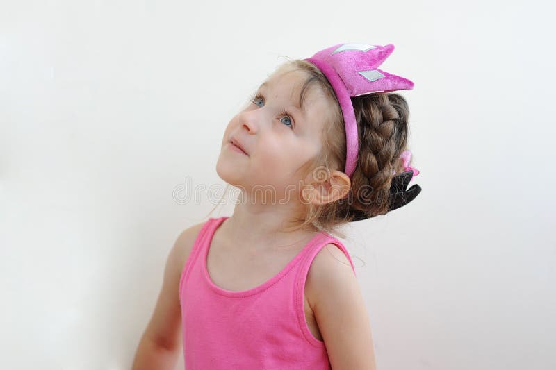 Nice surprised toddler girl in tiara