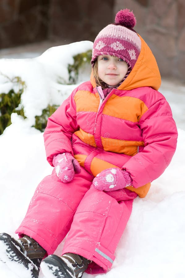 Nice toddler girl in winter pink hat