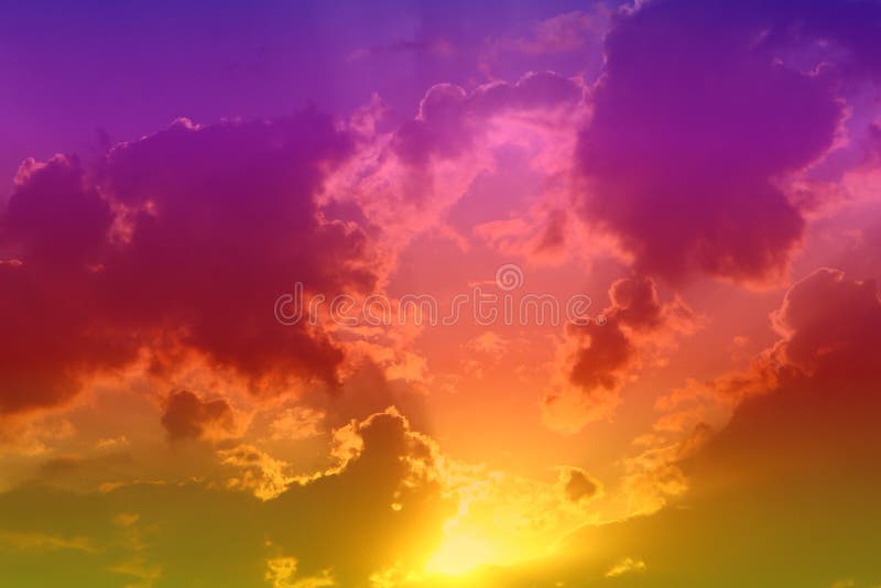 Nice vivid sunset or sunrise cloudy sky for using in design as background stock photo