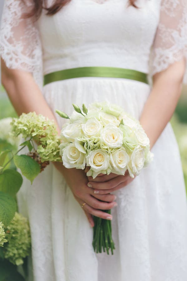 Nice wedding bouquet in bride`s hand royalty free stock image Nice wedding bouquet in bride`s hand royalty free stock image