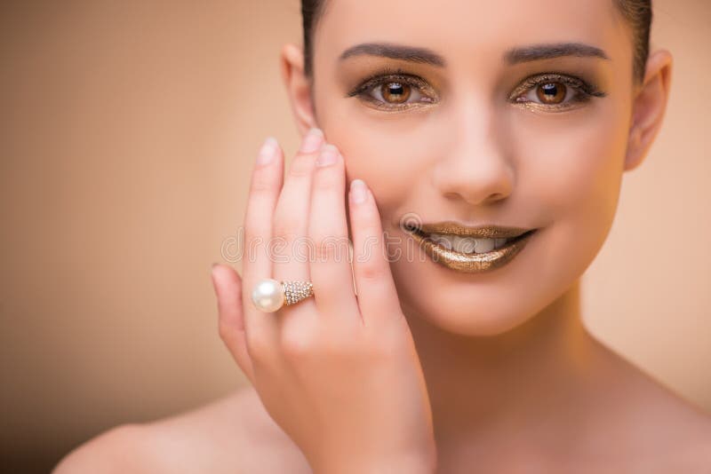 The nice woman wearing elegant jewellery. Brilliant, accessory.