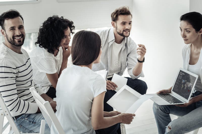 Nice young people looking at the world map royalty free stock images Nice young people looking at the world map royalty free stock images