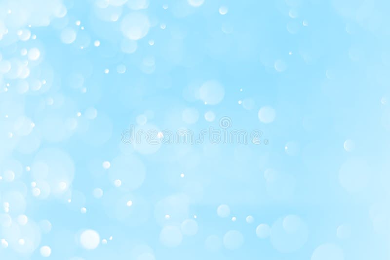 Niebieskie bokeh tło dla bożonarodzeniowego, kula śniegu