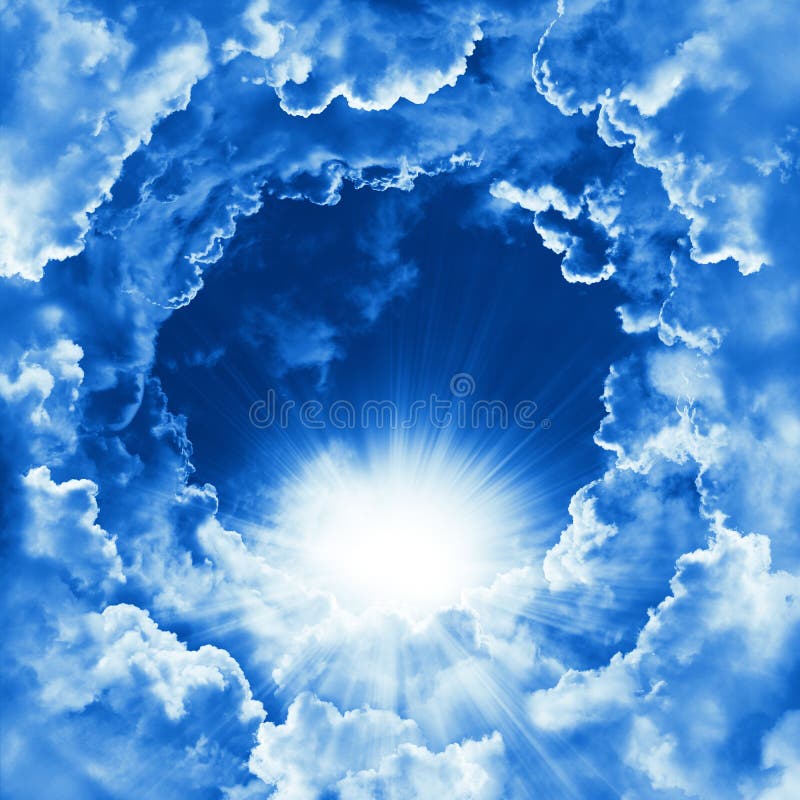 Sky with beautiful cloud and sunshine. Peaceful cloudy sky natural background. Sunny day. Religion concept heavenly background. Divine shining heaven, light. Sky with beautiful cloud and sunshine. Peaceful cloudy sky natural background. Sunny day. Religion concept heavenly background. Divine shining heaven, light