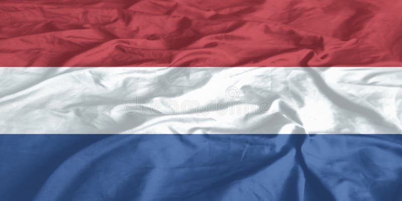 Niederländische Flaggenwinde schließen lizenzfreie stockfotografie