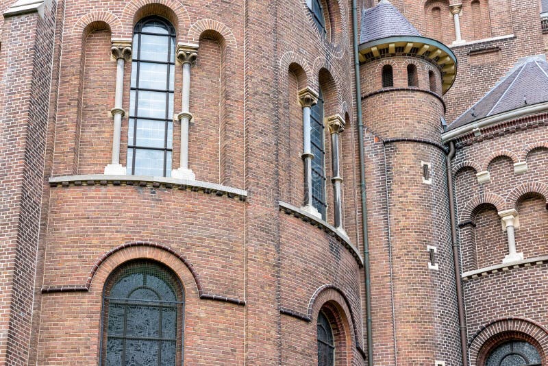 Facade church with windows and towers in Oss, The Netherlands. Facade church with windows and towers in Oss, The Netherlands