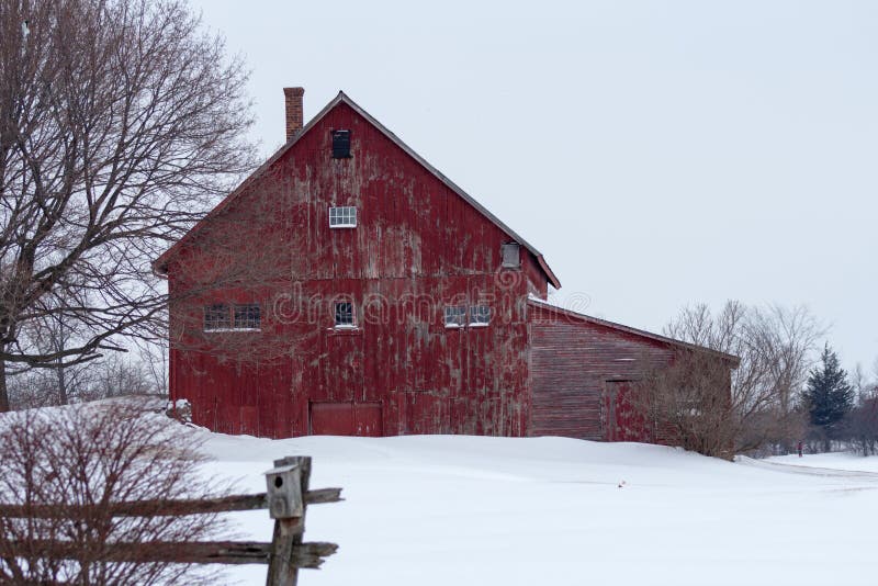 Old rustic red Vermont barn in winter. Old rustic red Vermont barn in winter