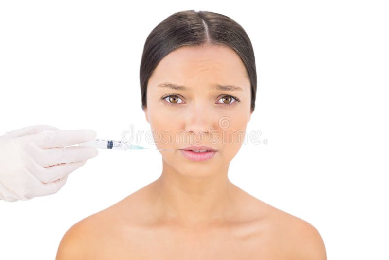 Niespokojny ogołaca modela ma botox zastrzyka wokoło usta zdjęcia royalty free Niespokojny ogołaca modela ma botox zastrzyka wokoło usta zdjęcia royalty free