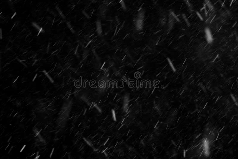 Nieve que cae en fondo negro foto de archivo Nieve que cae en fondo negro foto de archivo