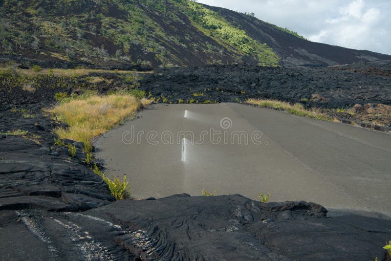 A road to nowhere. Flowing lava has blocked this road on Hawaii's Big Island. A road to nowhere. Flowing lava has blocked this road on Hawaii's Big Island