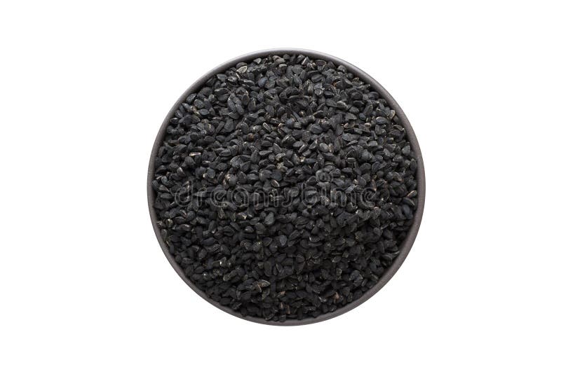 Nigella or Black cumin seeds in clay bowl isolated on white background. Seasoning or spice top view stock photos Nigella or Black cumin seeds in clay bowl isolated on white background. Seasoning or spice top view stock photos