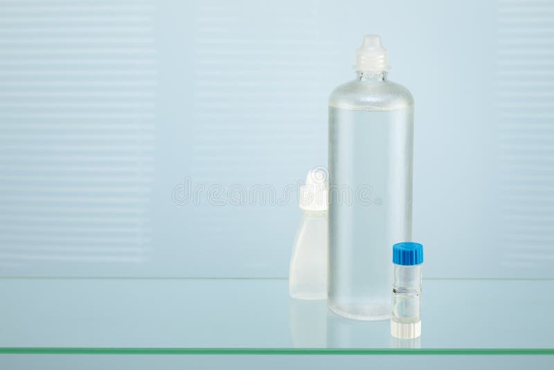 Night Contact Lenses, Eye Drops, Clean Solution and Copy Space Stock