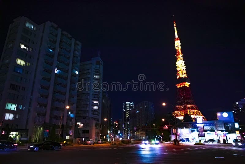 Night crossing behind the high tower in Tokyo stock photo Night crossing behind the high tower in Tokyo stock photo