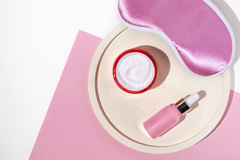 Night Face Care Routine Concept. Top View Sleeping Mask, Moisturizer