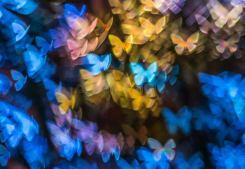 Night lights bokeh butterfly shape, defocused bokeh lights, blur stock images