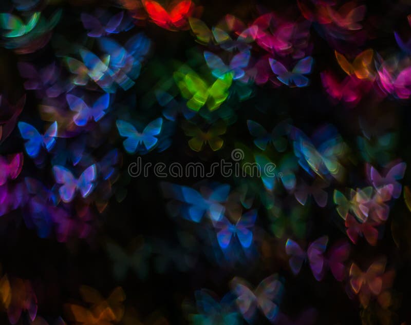 Night lights bokeh butterfly shape, defocused bokeh lights, blur royalty free stock photos