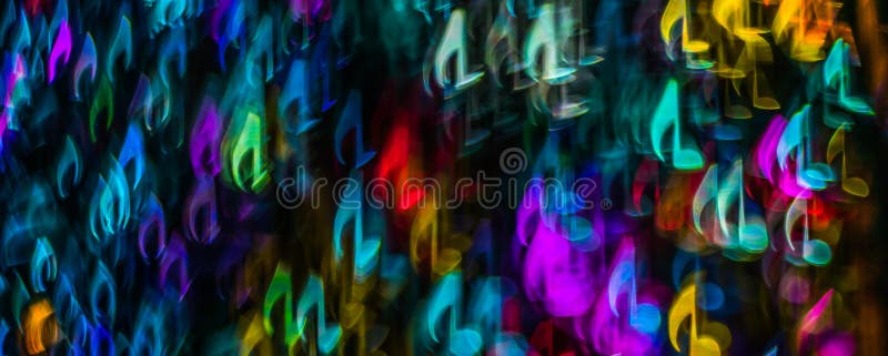 Night lights bokeh shaped sheet music, defocused bokeh light, bl royalty free stock photo