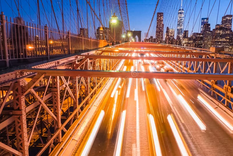 Night lights of car headlamps on the Brooklyn bridge. Long expos royalty free stock photos Night lights of car headlamps on the Brooklyn bridge. Long expos royalty free stock photos